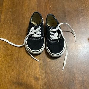 White and black toddler Vans